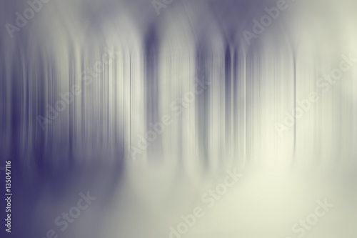 blurred dark gray gradient background with vertical stripes