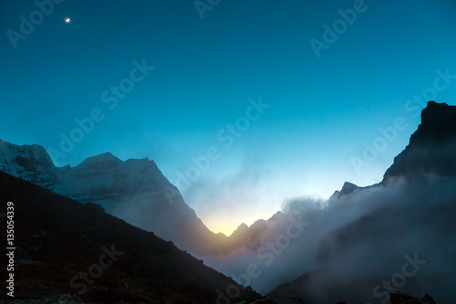 Evening Mountain View with Sunset and Moonrise