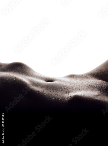 Sensual female body with drops of water isolated on white backgr