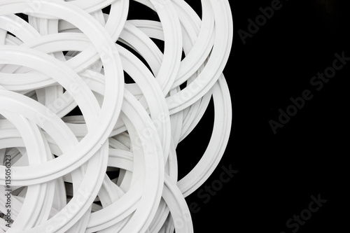 Rubber white silicone sealing spare parts for industryon black background.