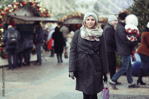 urban portrait of woman in winter clothes