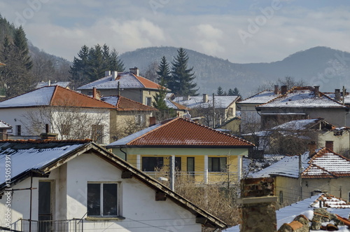 Residential district of bulgarian houses in winter village Pasarel, Bulgaria   © vili45