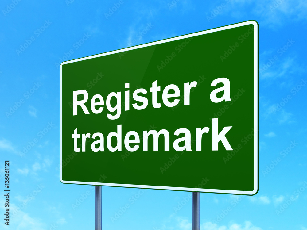 Law concept: Register A Trademark on road sign background Law concept: Register A Trademark on road sign background
