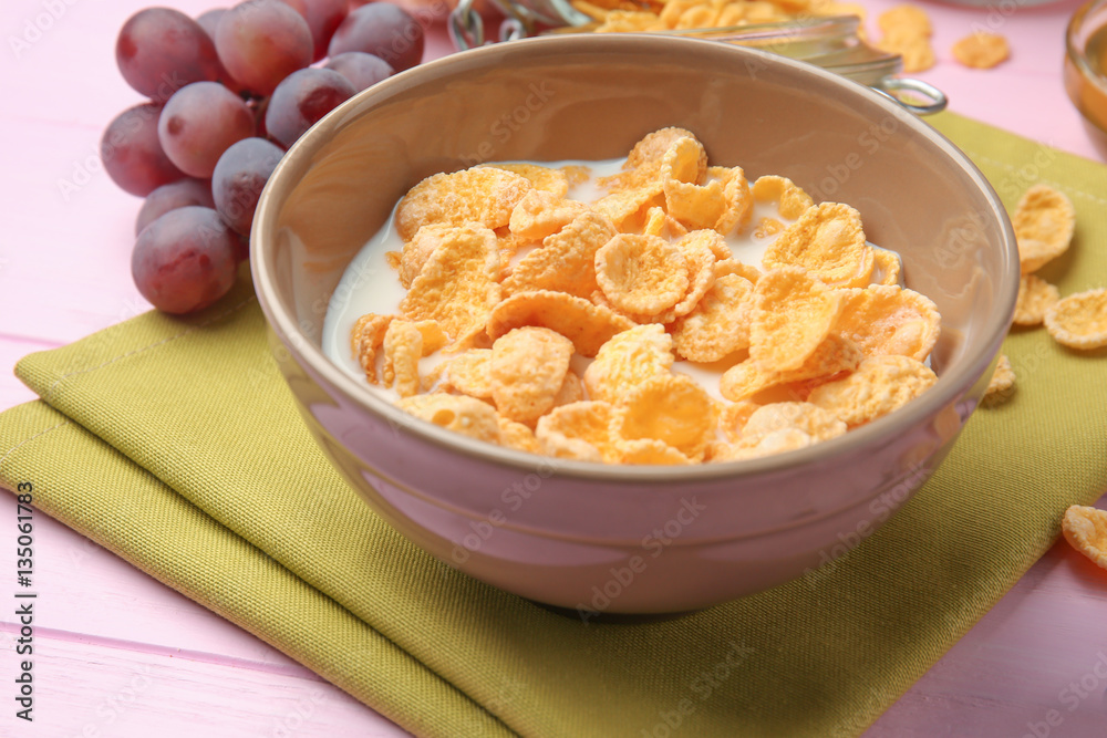Tasty cornflakes on pink background Tasty cornflakes on pink background