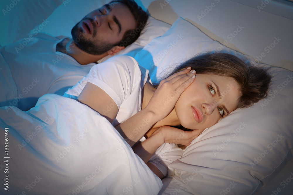 Young girl can't sleep because of her man's snoring Young girl can't sleep because of her man's snoring