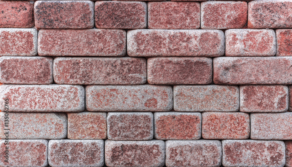 Wall of Indian sandstone with a beautiful structure, decorative building facing material Wall of Indian sandstone with a beautiful structure, decorative building facing material