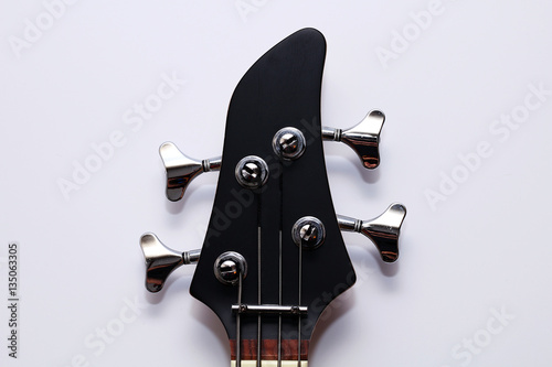 Black electric bass guitar