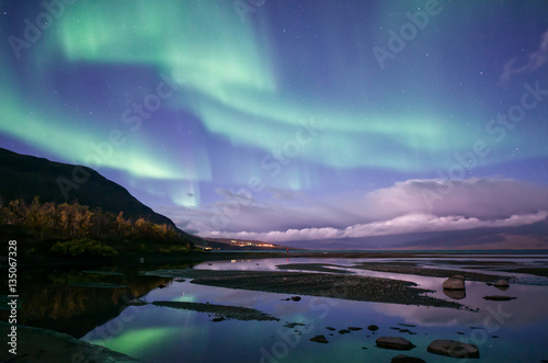 Canvas-taulu Northern lights dancing over Abisko national park in Sweden