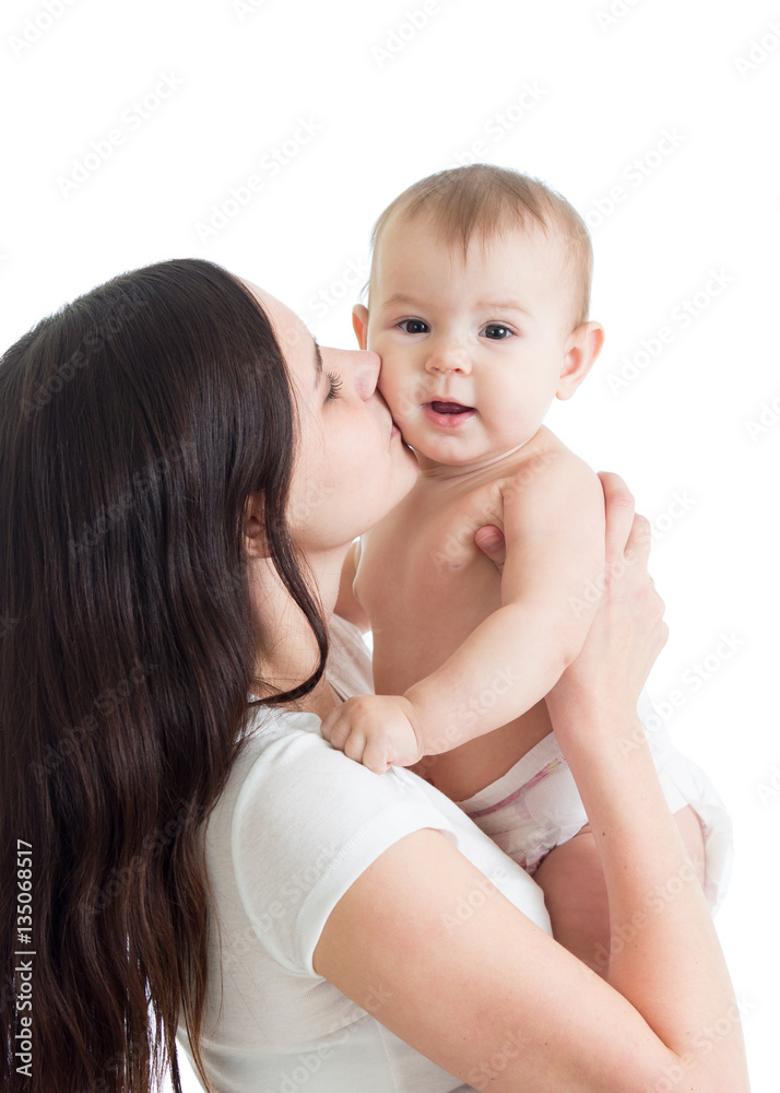Happy family. A young mother with baby kissing and hugging. Happy family. A young mother with baby kissing and hugging.
