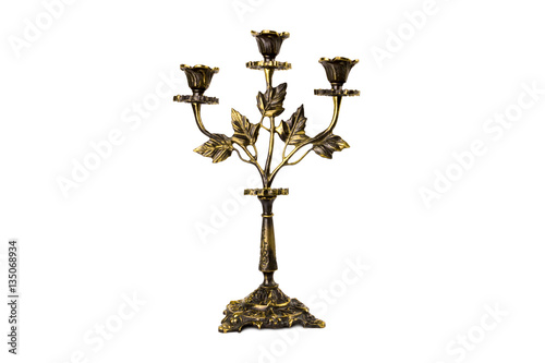 antiquarian candlestick isolated on white background.