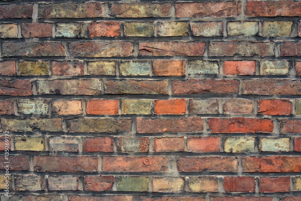 Colorful brick wall texture background. Traditional brick from the city of Bruges. Belgium. Colorful brick wall texture background. Traditional brick from the city of Bruges. Belgium.