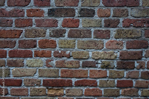 Colorful brick wall texture background. Traditional brick from the city of Bruges. Belgium.