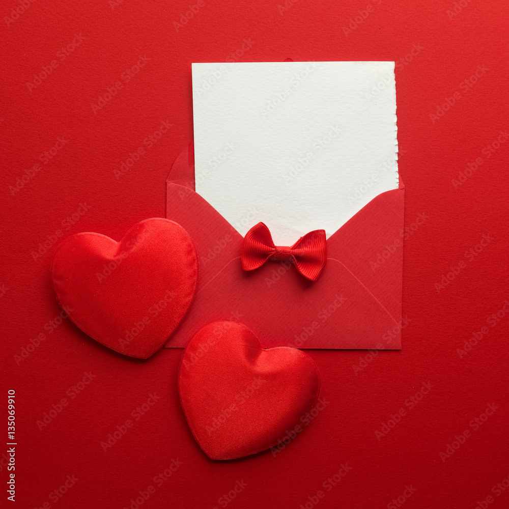 Envelope Mail, Heart and Ribbon on red Background. Valentine Day Card, Love or Wedding Greeting Concept. Top view Envelope Mail, Heart and Ribbon on red Background. Valentine Day Card, Love or Wedding Greeting Concept. Top view