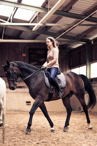 Woman Riding Her Horse © nullplus