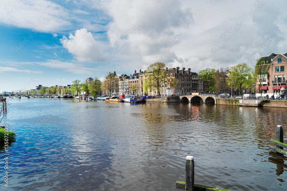 embankment of Amstel canal water in Amsterdam, Netherlands
