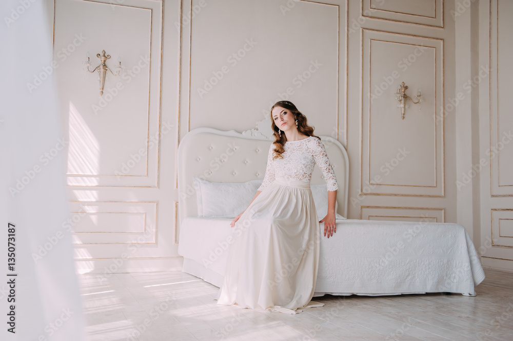 fashion studio photo of beautiful elegant bride with dark hair in luxurious wedding dress fashion studio photo of beautiful elegant bride with dark hair in luxurious wedding dress