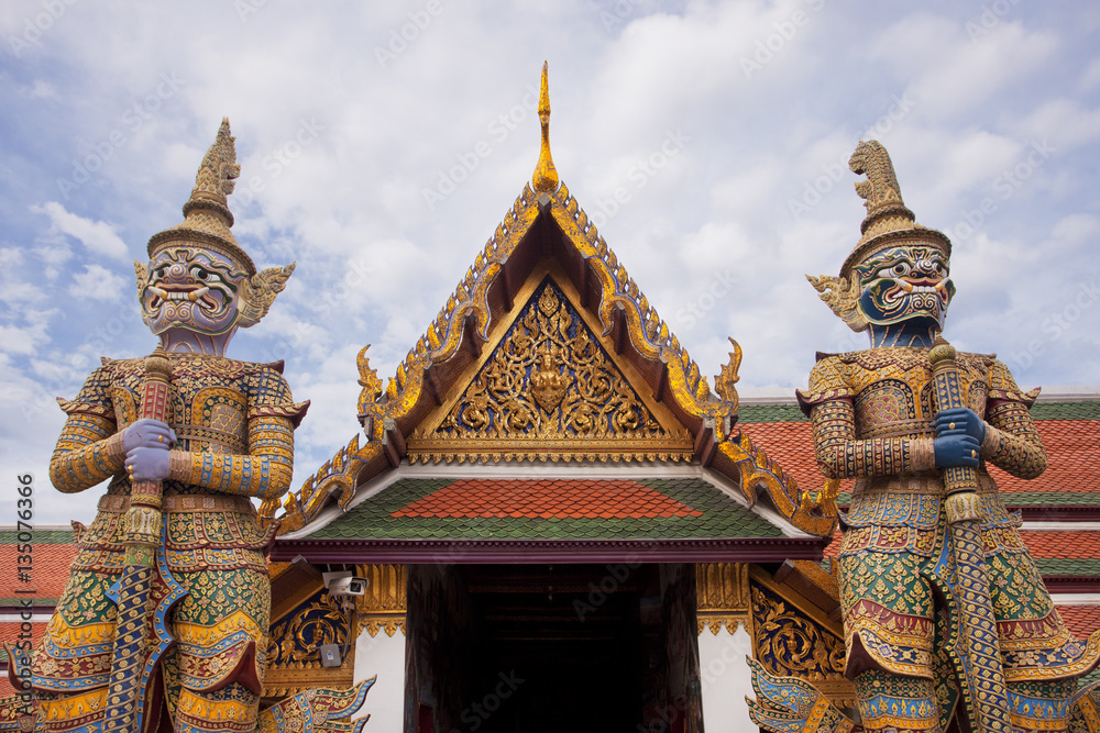 Giant demons at the entrance of the Wat Phra Kaew in Bangkok Thailand 