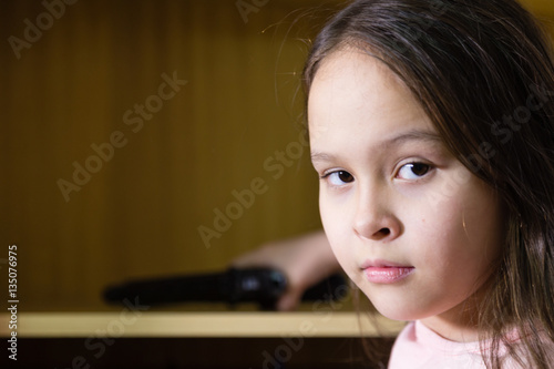 Young girl finds gun in closet
