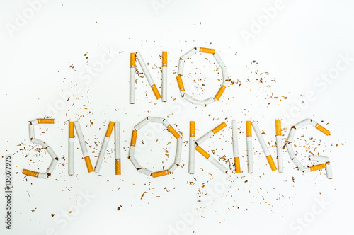 No smoking words written with broken cigarettes