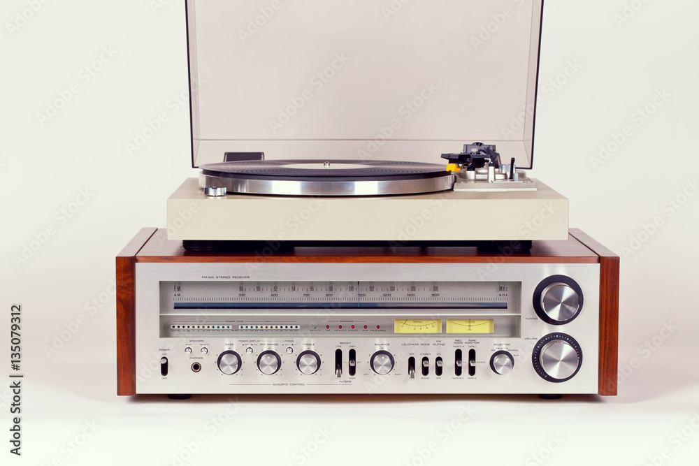 Obraz premium Vintage Stereo Radio Receiver with Record Player Turntable Set