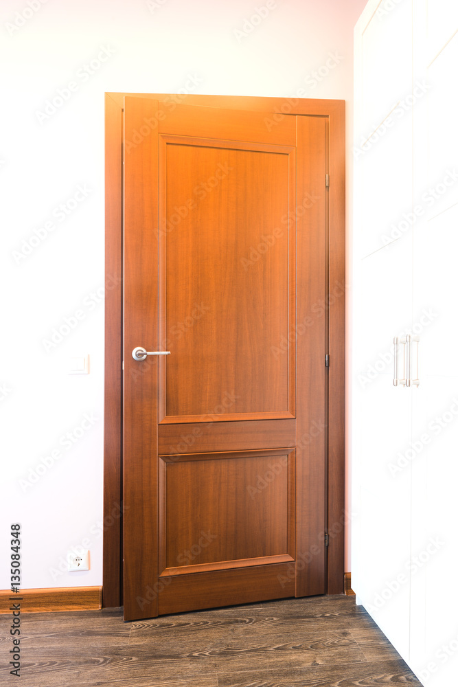 Wooden door in the bedroom