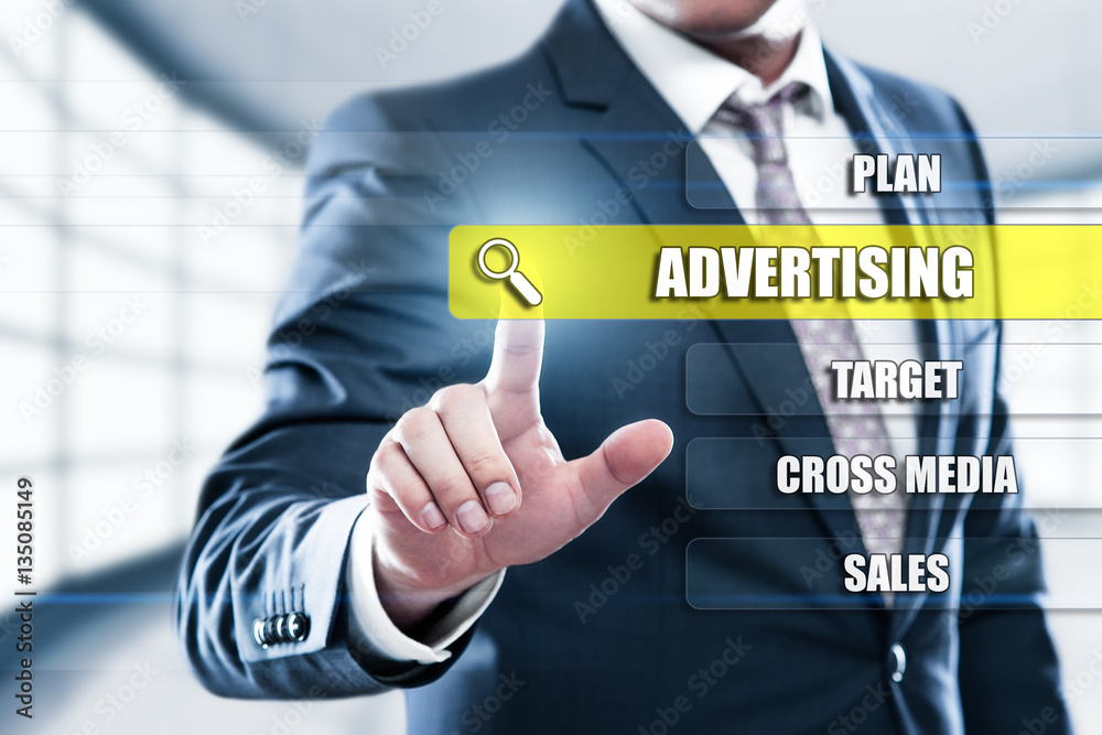 Advertising Marketing Plan Branding concept on presentation screen. Man pressing button on display with word in modern office Advertising Marketing Plan Branding concept on presentation screen. Man pressing button on display with word in modern office