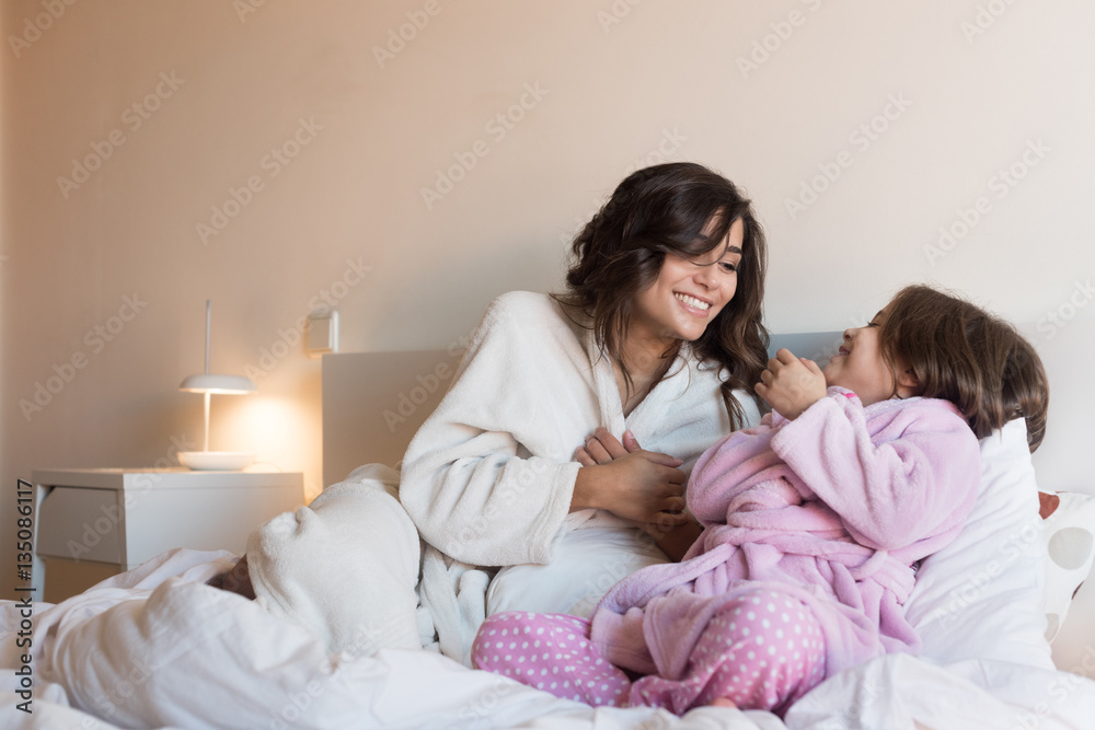 Mother and daughter in bed Mother and daughter in bed
