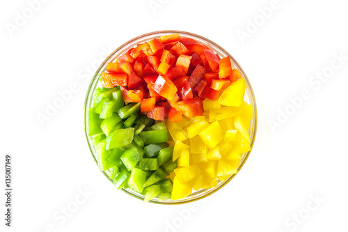 Diced Red, Green & Yellow Pepper together in white bowl