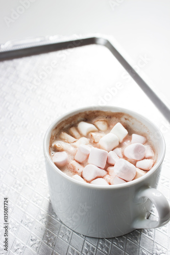 Mug filled with hot chocolate and marshmallow