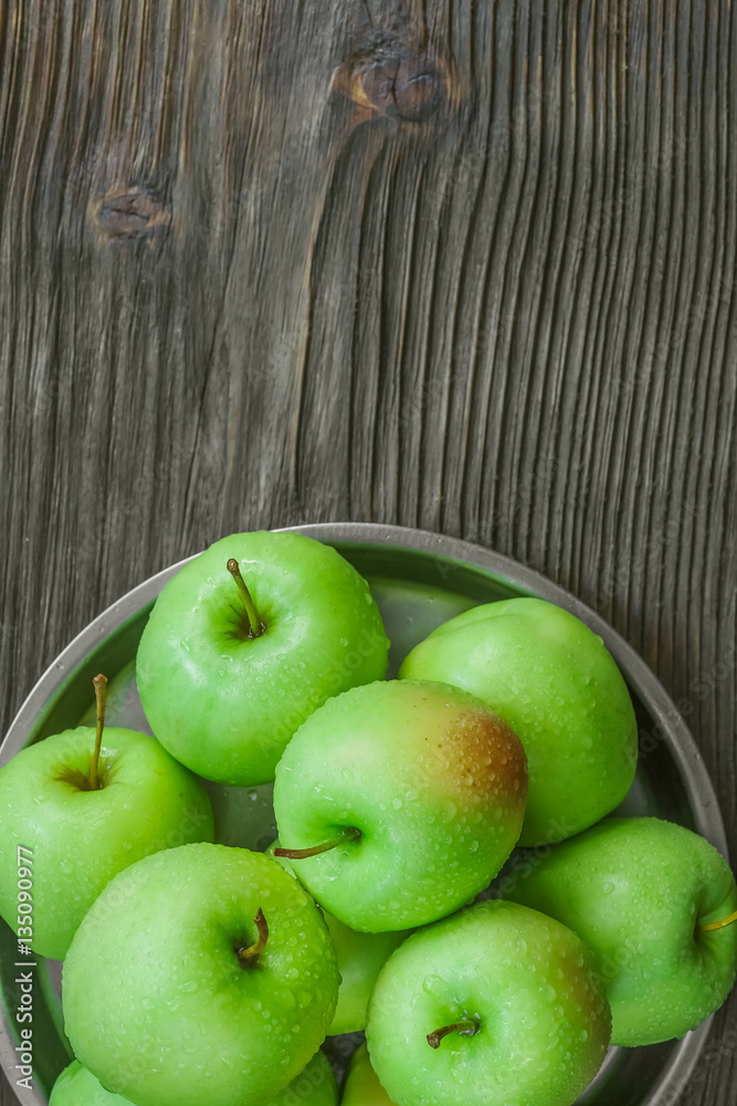 Ripe green apples on wooden background Ripe green apples on wooden background