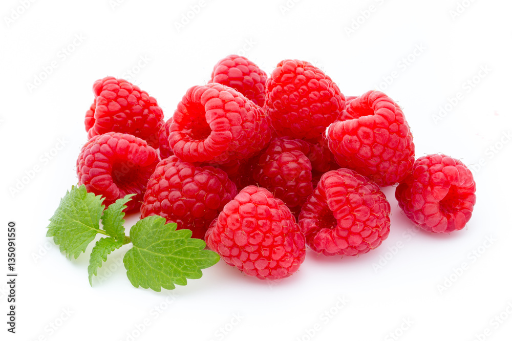 Ripe red raspberries isolated on white background. Ripe red raspberries isolated on white background.