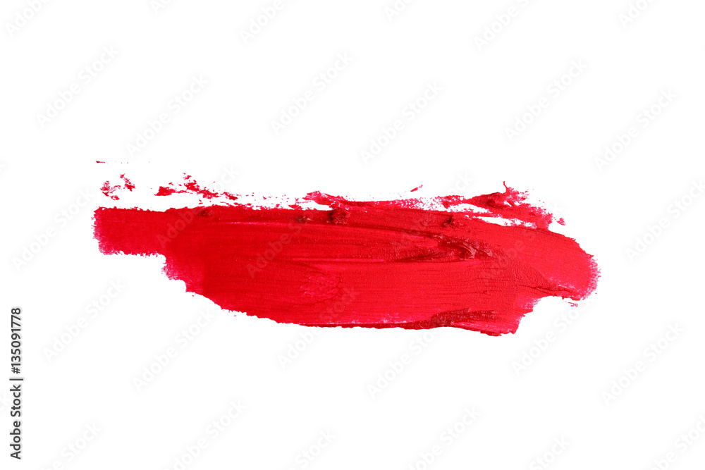 Smudged lipstick on white background