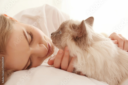 Beautiful young woman with ...