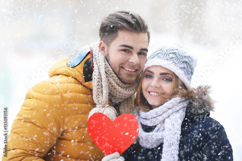 Young couple with heart in ...