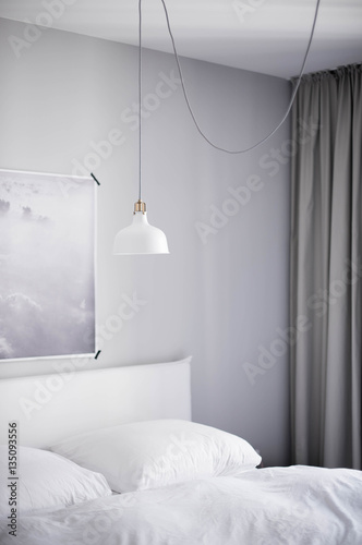 minimalistisch eingerichtetes Schlafzimmer mit Wolken Poster photo