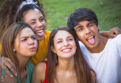 Group of happy teenagers in the park © Andriy Petrenko