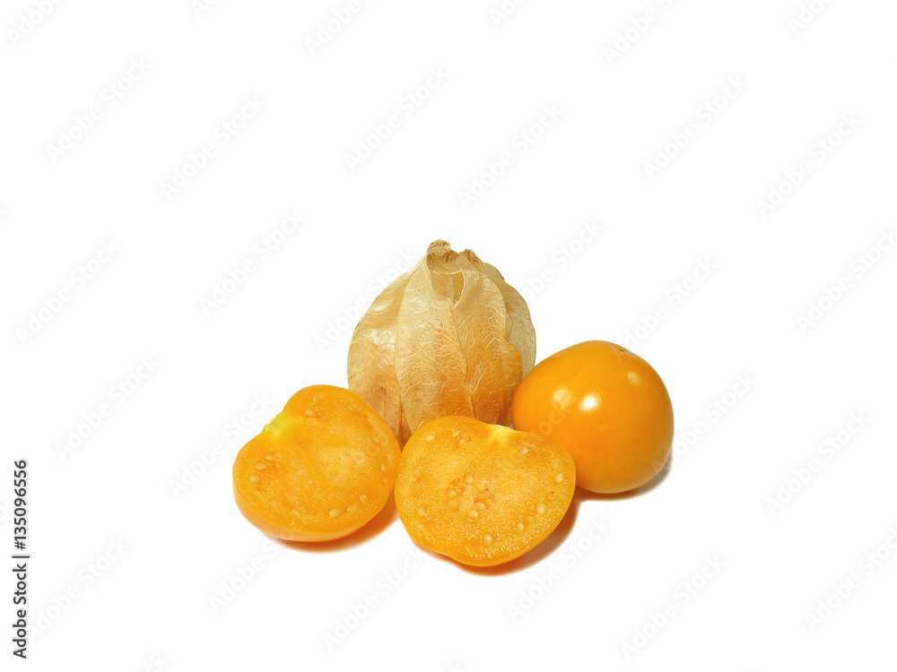 Close-up of bright yellow ripe Cape gooseberries, one with calyx, one whole,one cut in half isolated on white background Close-up of bright yellow ripe Cape gooseberries, one with calyx, one whole,one cut in half isolated on white background