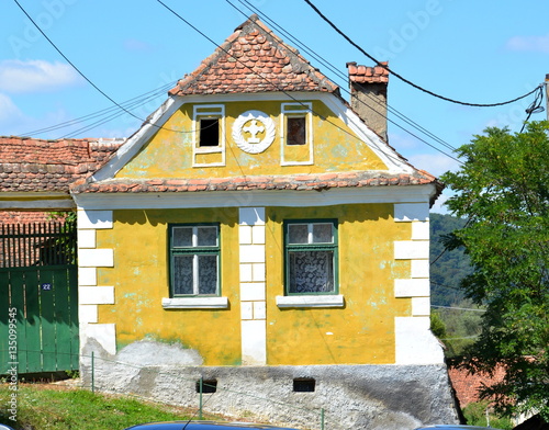 Typical house in the village  Crit-Kreutz, Transylvania. The villagers started building a single-nave Romanesque church, which is uncommon for a Saxon church, in the 13th century. photo