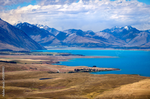 Landscape view of Lake Tekapo and mountains from Mt John