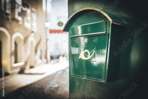 Green mail box on the sreets of Salzburg, Austria photo