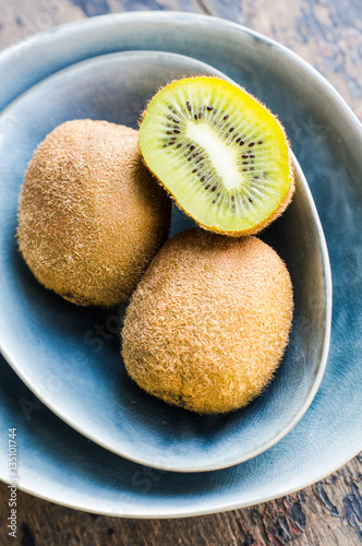 Organic fruits kiwi in bright bowl