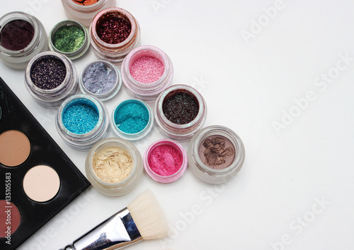 Brushes and makeup pigments.