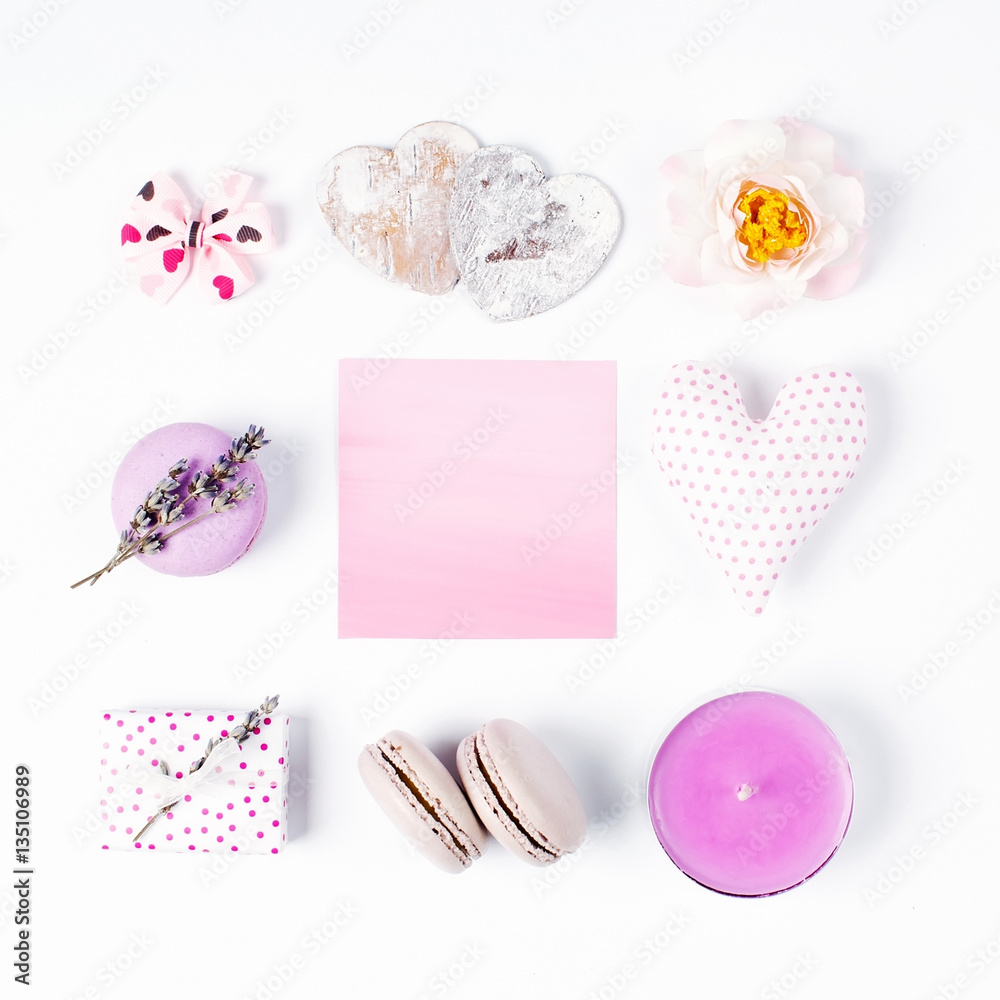Stylish romantic accessories. Cake macaroon, lavender, heart, candle, rose, gift, bow and pink empty card. flat lay