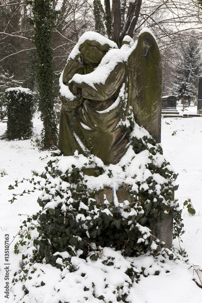 Snowy Angel from the mystery old Prague Cemetery, Czech Republic