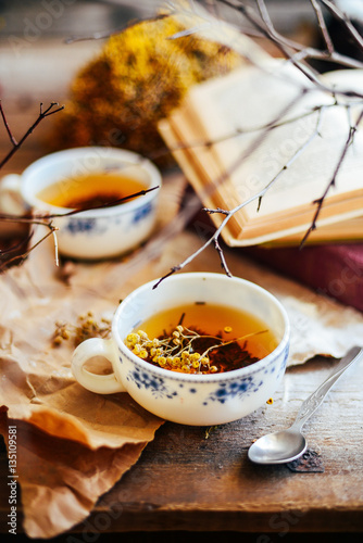 Cup of tea , rustic style.  cup of tea with spices and lemon on