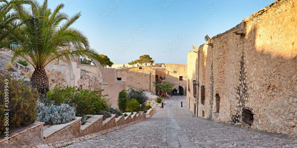 Panoramic view of the castle Santa Barbara. The ruins the chapel and out the fortress. Alicante, Spain.