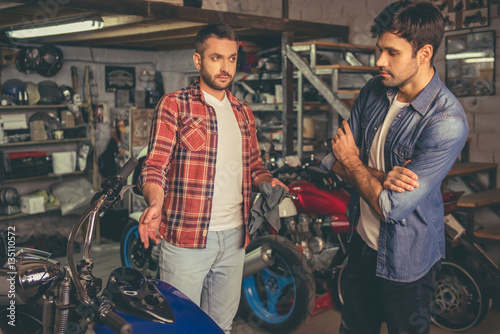 Guys at the motorbike repair shop
