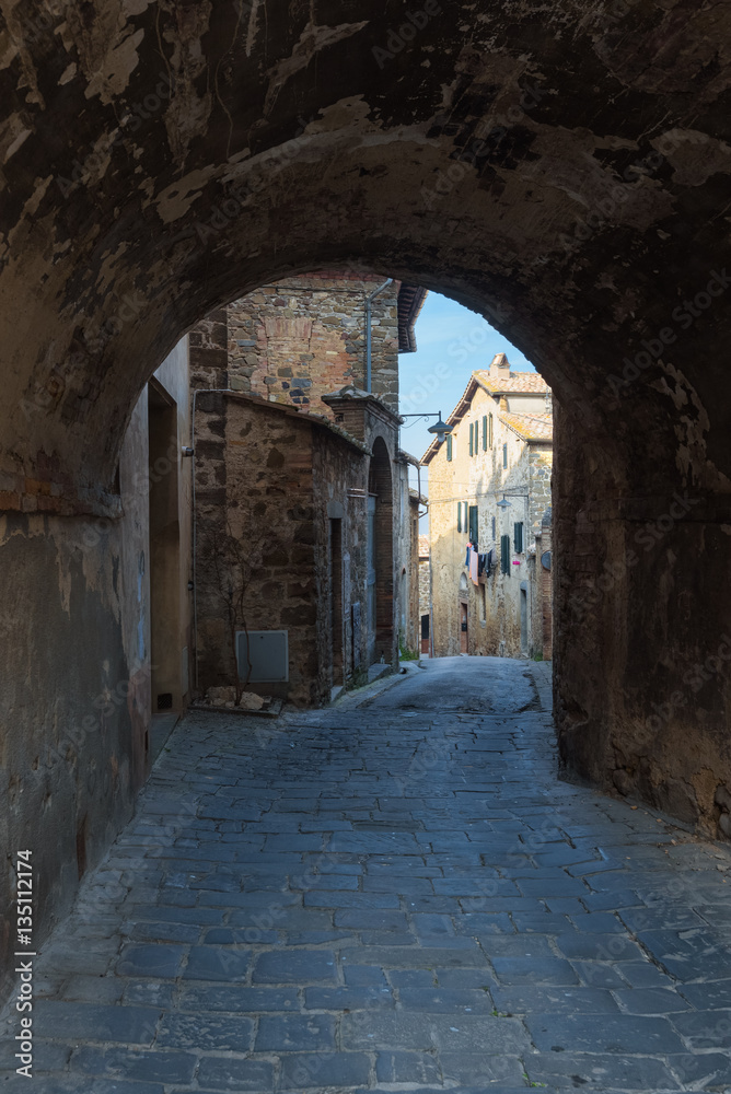 Hidden streets and corners of the arches in Montalcino, Tuscany.