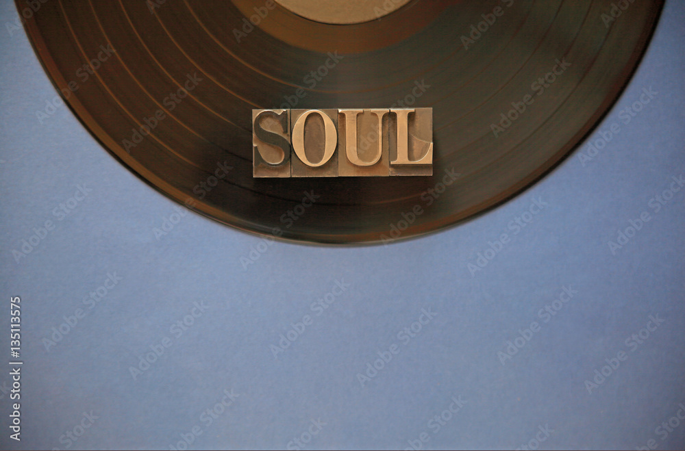 Φωτογραφία Black vinyl record with the word soul in metal type with room for copy