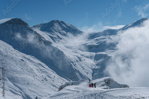 Group hiking on snow-covered mountains in winter © Bogdan